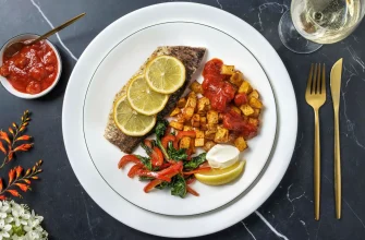 Robalo al limón con patatas bravas – un plato español de pescado con un toque cítrico y picante